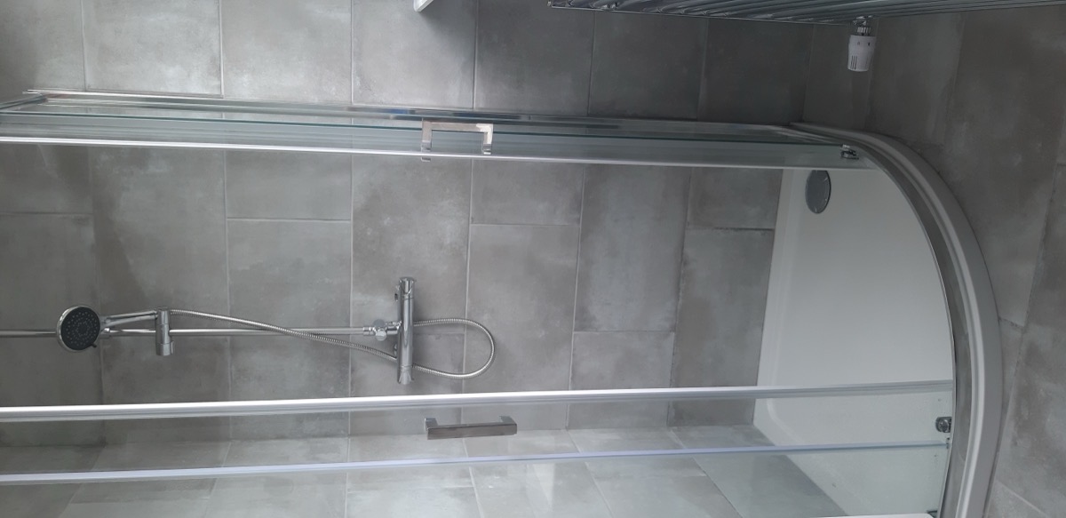 Bathroom renovation with new suite and tiling