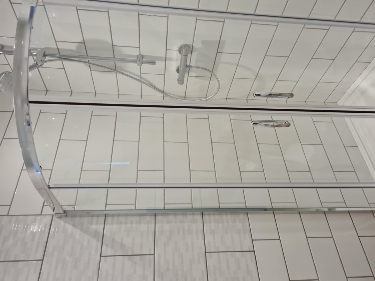 Tiled shower room basin and WC
