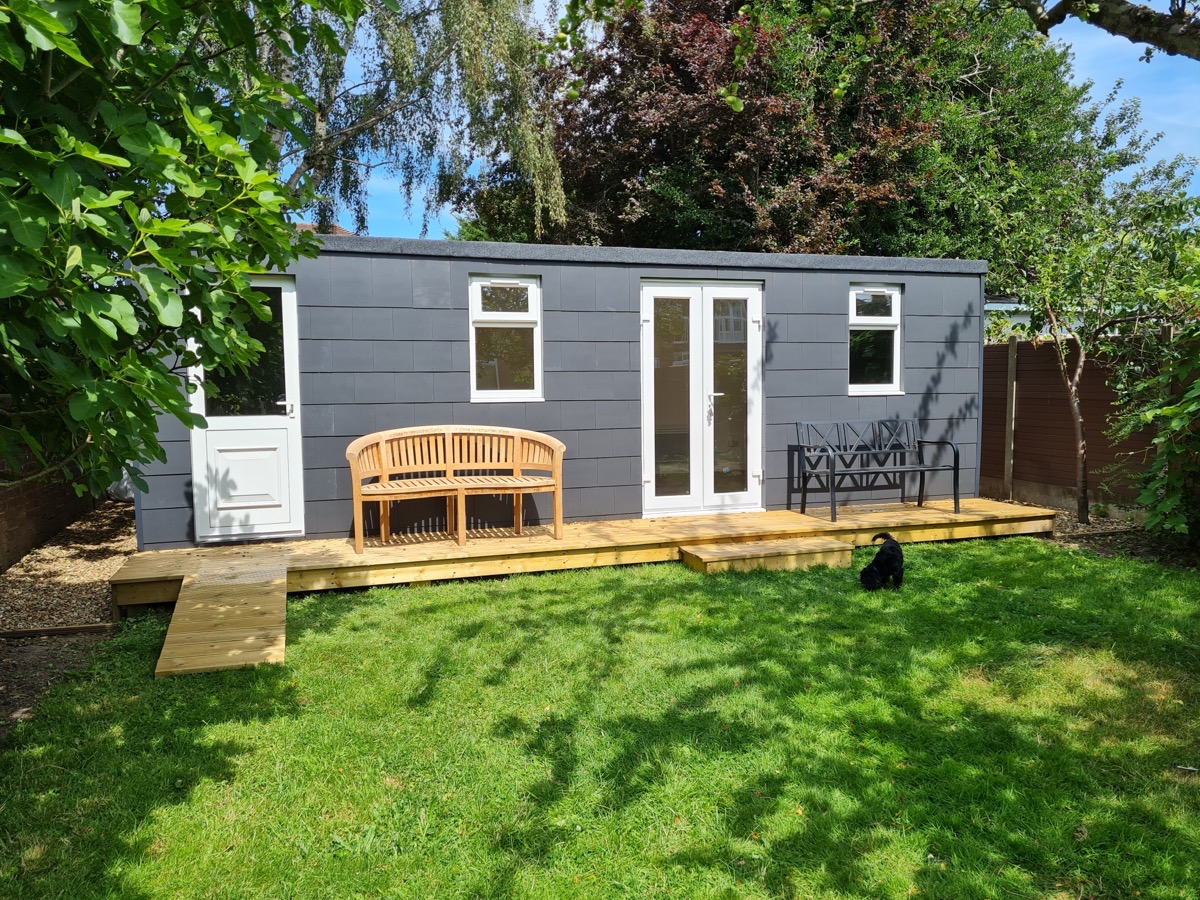 Timber garden office with large windows