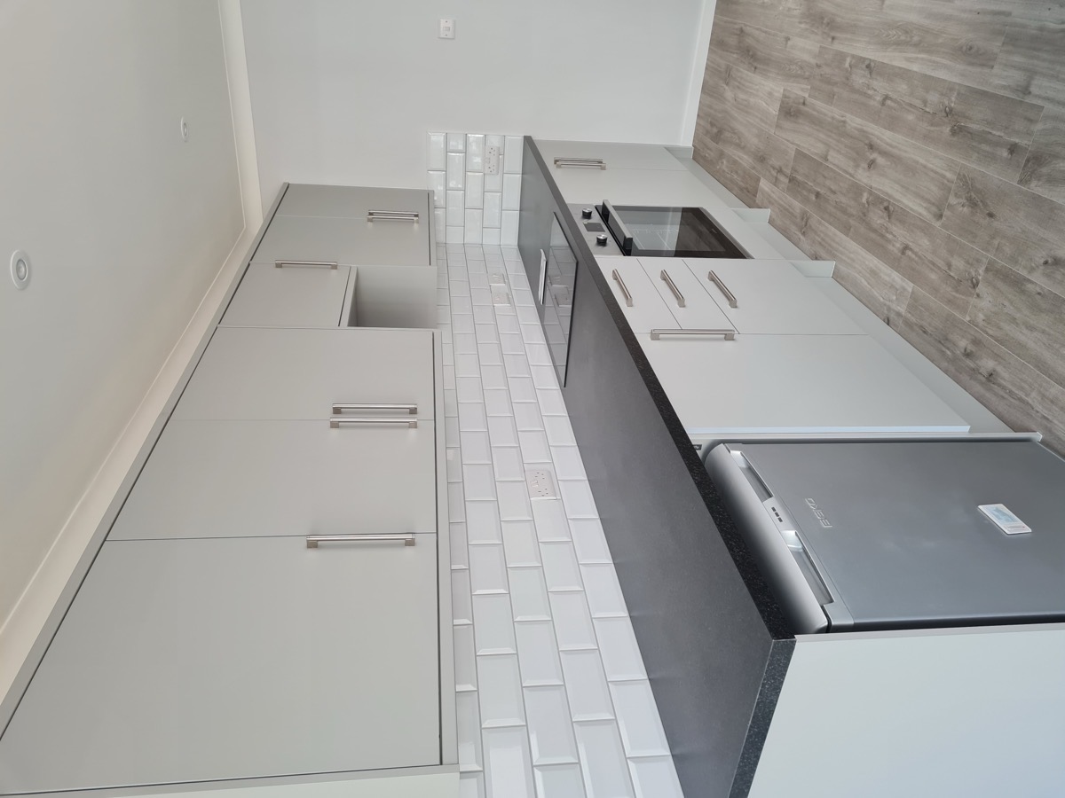 Grey shaker kitchen with quartz worktops