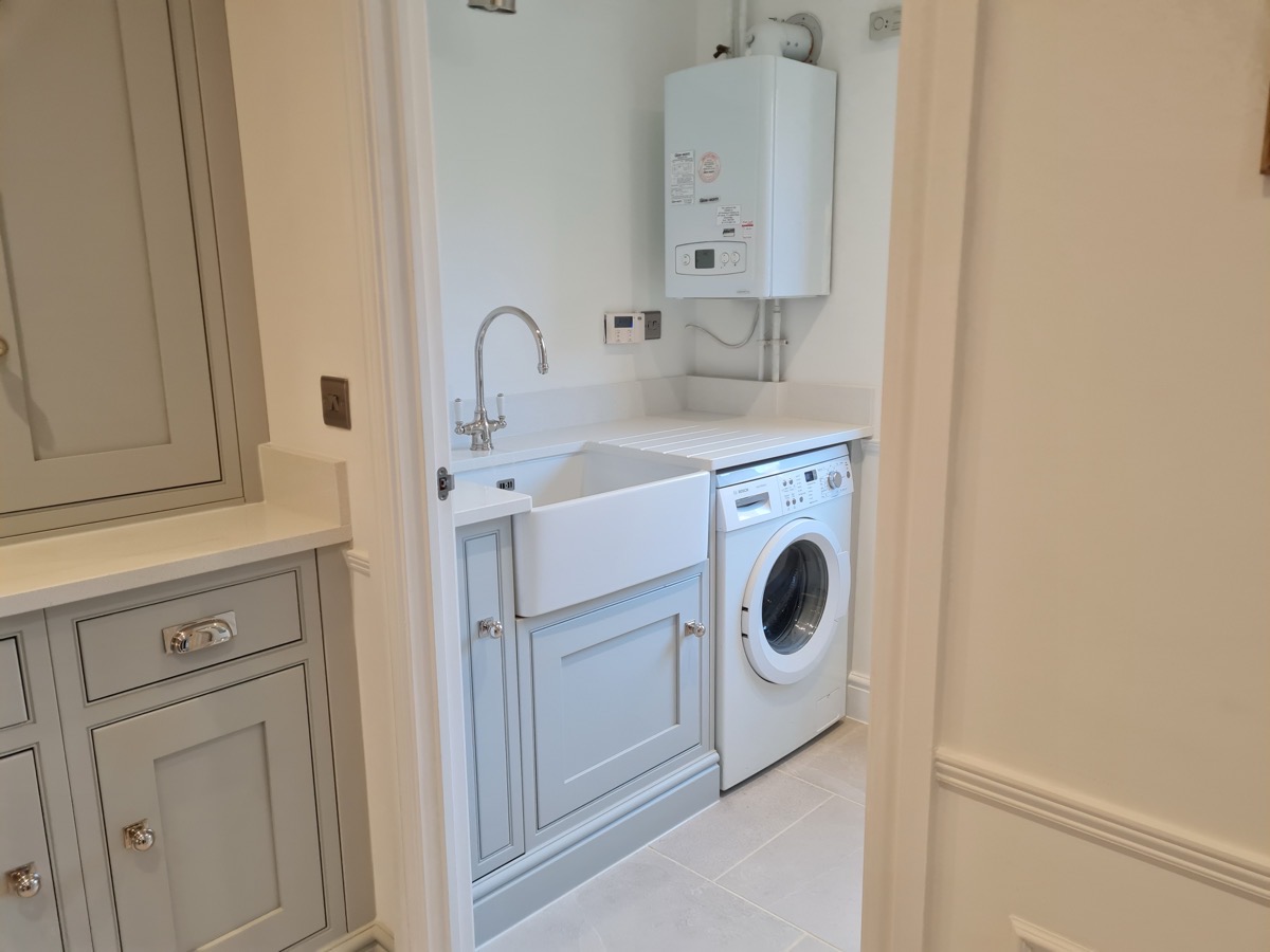 Grey shaker kitchen with bi-fold doors