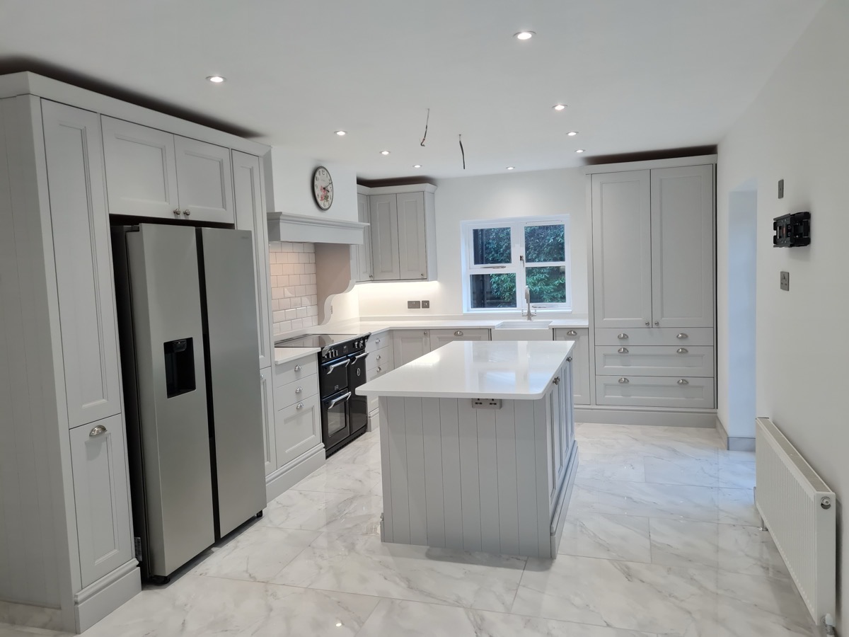 Grey shaker kitchen island and French doors