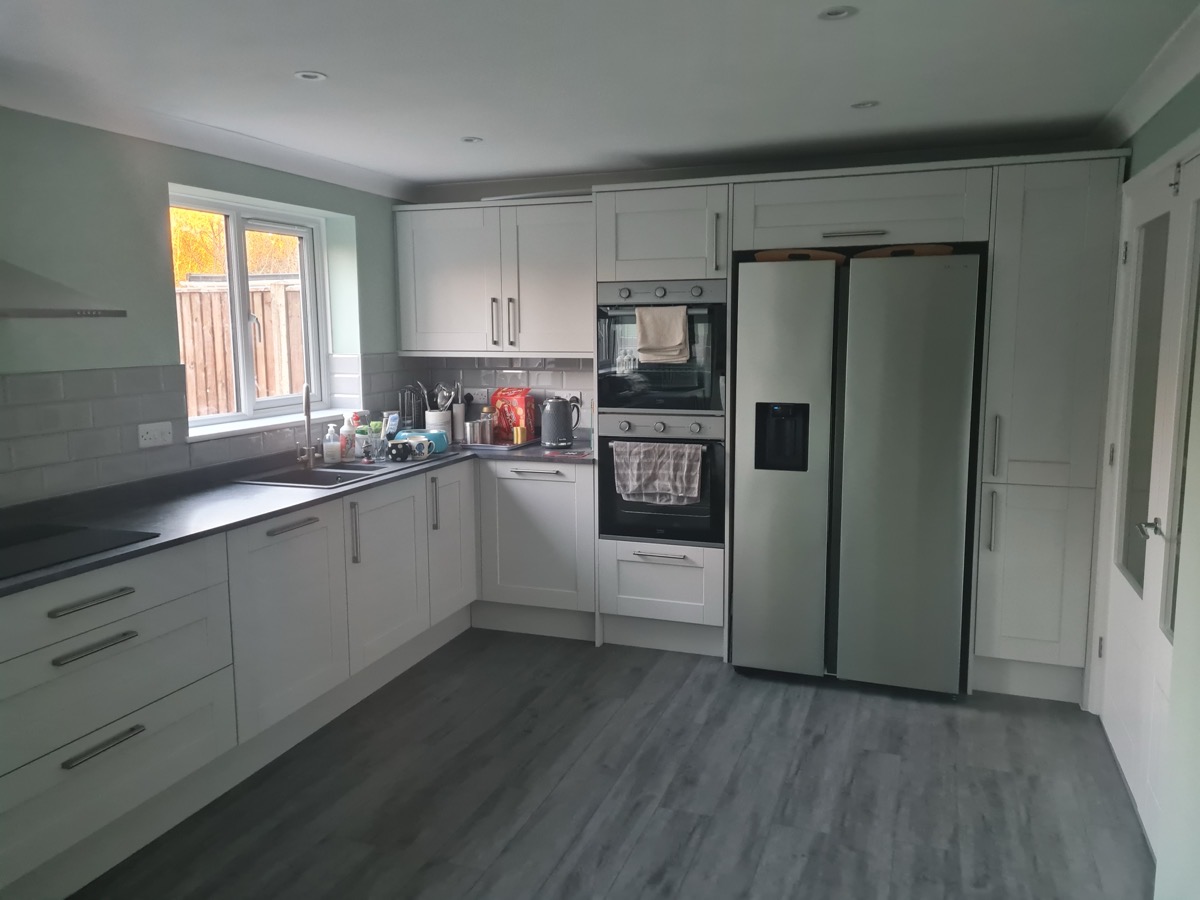 Grey shaker kitchen with American fridge freezer